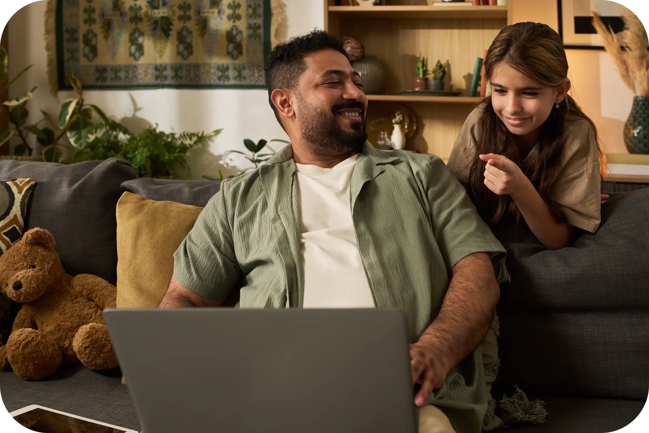 Daughter With Father Looking At Computer
